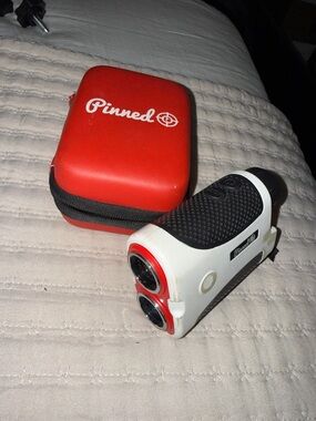 Pinned White & Black Laser Golf Rangefinder with Red Case